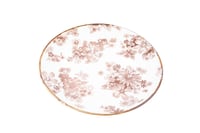 صحن سيراميك دائري ابيض في بني