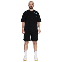 تيشيرت سيلين بعلامة الأعين من الأمام للجنسين (اسود...