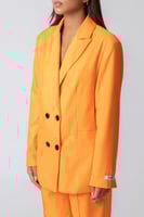 جاكيت رسمي نسائي بقصة طويلة برتقالي