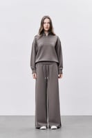 سويتر بني نسائي