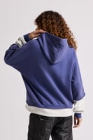 هودي بقصة واسعة Acid Wash وأكمام من لون مختلف للجن...