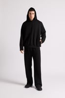 هودي بطباعة وقصة واسعة Acid Wash للجنسين أسود