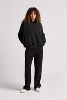 هودي بطباعة وقصة واسعة Acid Wash للجنسين أسود