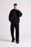 هودي بطباعة وقصة واسعة Acid Wash للجنسين أسود