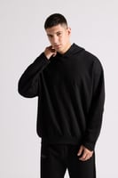 هودي بطباعة وقصة واسعة Acid Wash للجنسين أسود