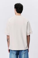 تيشيرت إنترلوك أوف وايت للجنسين