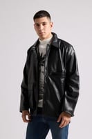 جاكيت جلد بقصة واسعة للجنسين أسود
