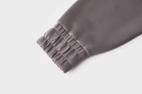 سويتر بني نسائي