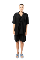 قميص واسع وبأكمام قصيرة للجنسين اسود