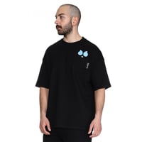 تيشيرت سيلين بعلامة الأعين من الأمام للجنسين (اسود...