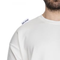 تيشيرت بشعار سيلين من الخلف للجنسين (اوف وايت)