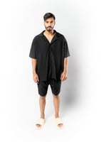 قميص واسع وبأكمام قصيرة للجنسين اسود