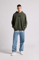 هودي بقصة واسعة Acid Wash للجنسين أخضر غامق