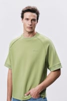 تيشيرت إنترلوك أخضر للجنسين