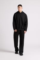 هودي بطباعة وقصة واسعة Acid Wash للجنسين أسود