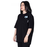 تيشيرت سيلين بعلامة الأعين من الأمام للجنسين (اسود...