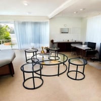 طقم طاولات اسود ارضي