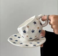 كوب بطابع الازهار