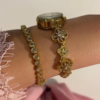 ساعة Rose ذهبي مع اسورة تنس مجانية