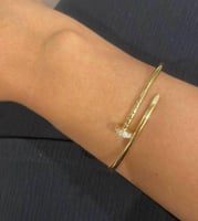 سوارة المسمار بألماس ذهب اصفر مقاس 15 و 17