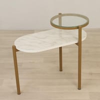 طاولة خدمة بمستويين سطح بيضاوي بنمط رخامي وعلوي زج...