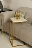 طاولة خدمة مستطيلة بسطح كريمي بنمط رخامي وإطار معد...