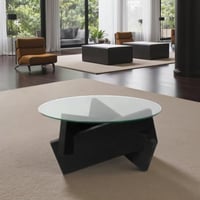 طاولة قهوة دائرية سطح زجاجي وقاعدة خشبية هندسية سو...