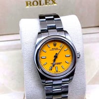 ساعة رولكس بربتشوال مينا اصفر