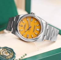 ساعة رولكس بربتشوال مينا اصفر