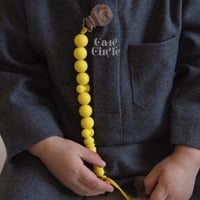 سبحة حامل للمصاصة أصفر | أولاد