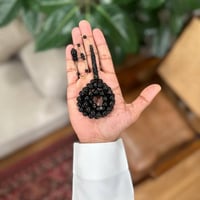 مسباح اليسر الأسود مدور