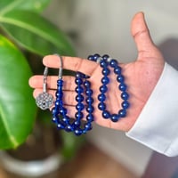 مسباح فاتوران أزرق شفاف مع فواصل