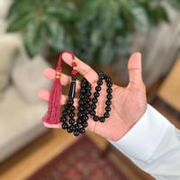 مسباح بكلايت أسود كركوشة عنابية