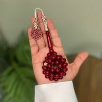 مسباح بكلايت عنابي غامق مع فواصل وطرابزونة عنابي