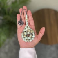 مسباح بكلايت فستقي مع فواصل