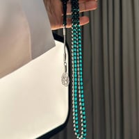 مسباح زعفراني سماوي 99