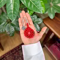 مسباح فاتوران عنابي