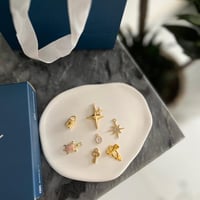 تعليقة تشارمز ذهبي