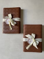 هدية مصحف مع تغليف جلد