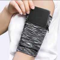 ربطة ذراع مع جيب و سحاب مخفي لتجنب السرقة