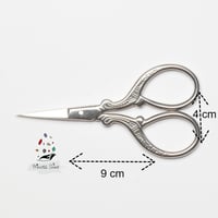 205 - مقص ورق فضي