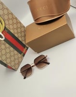 نظارة قوتشي اطراف ذهبي العدسة بني