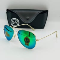 نظاراة ري بان اطراف ذهبي لون العدسة خضراء