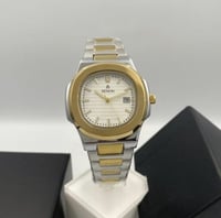 ساعةت universe point ذهبي على فضي