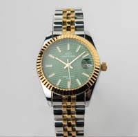 ساعة نسائية SVENSTAR ذهبي على فضي