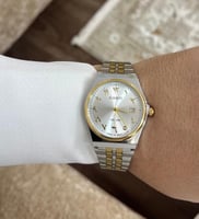 ساعة كاسيو casio MTP لونين ارقام عربية ابيض