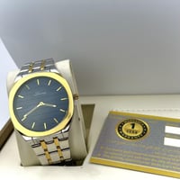 ساعة رجالية من LUXURY لون كحلي بإطار ذهبي