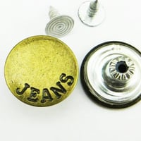 أزرار الجينز كبير