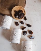 شمعة برائحة التمر