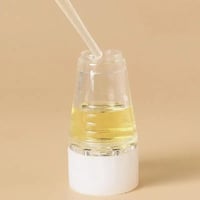 أداة توزيع زيت الشعر 6 مل